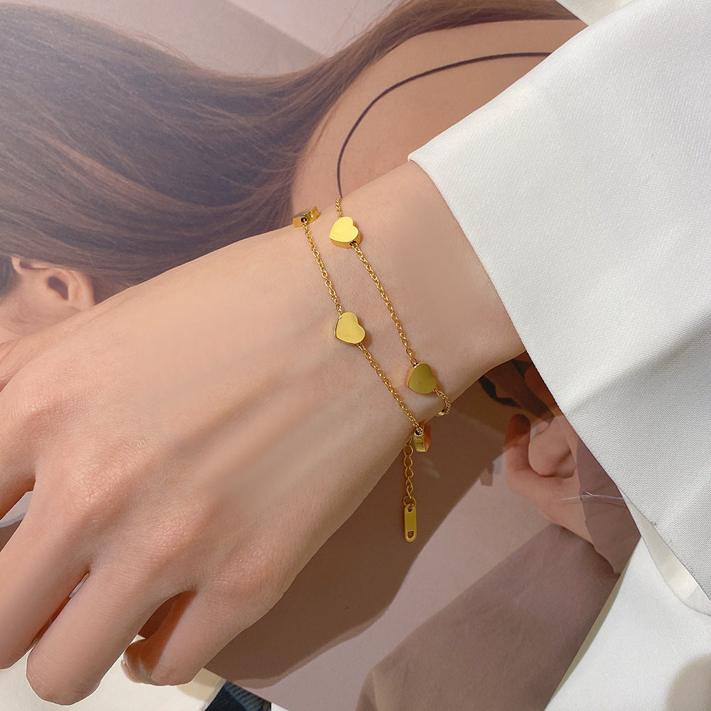 Veyra Damenarmband Doppelherz – Titanstahl Gold