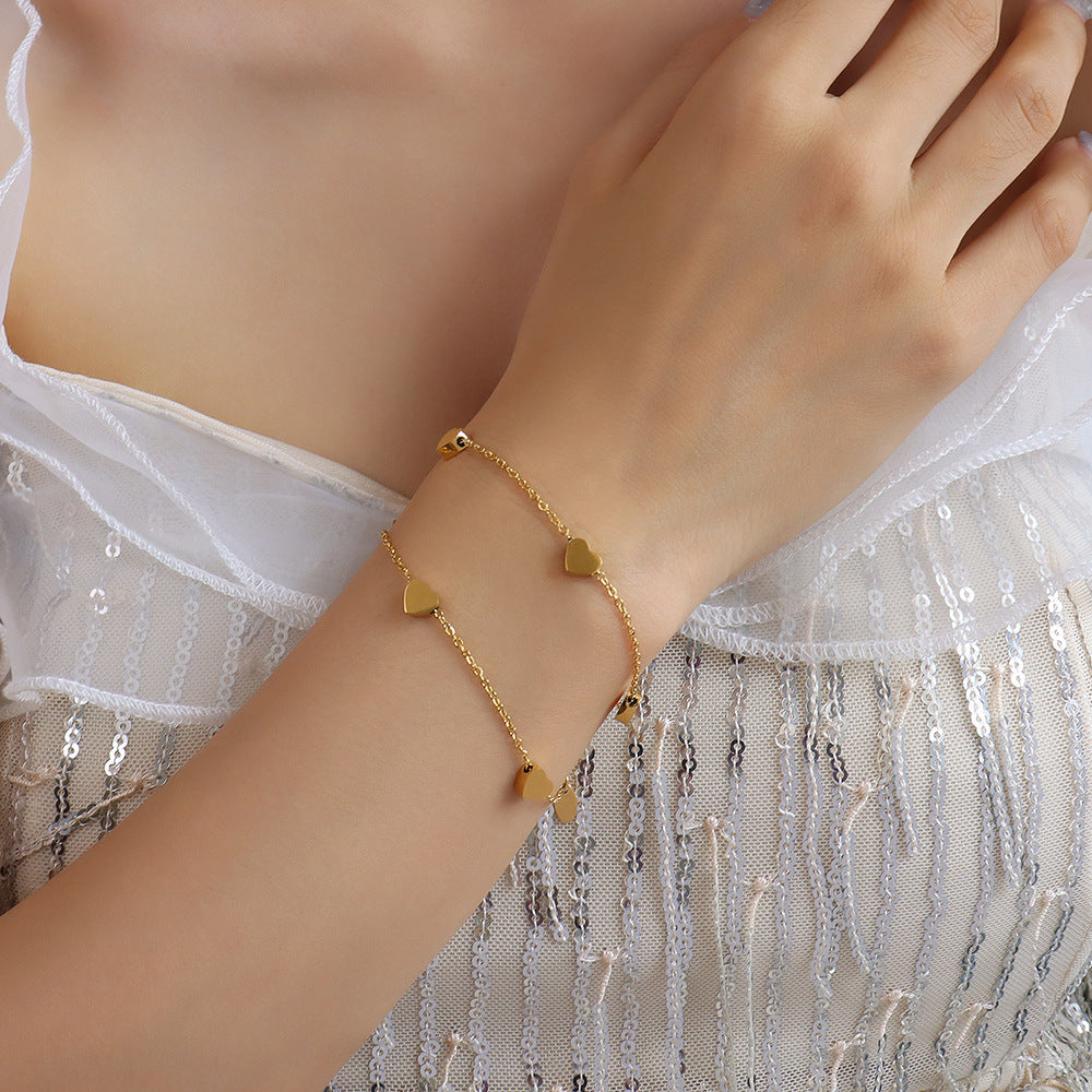 Veyra Damenarmband Doppelherz – Titanstahl Gold